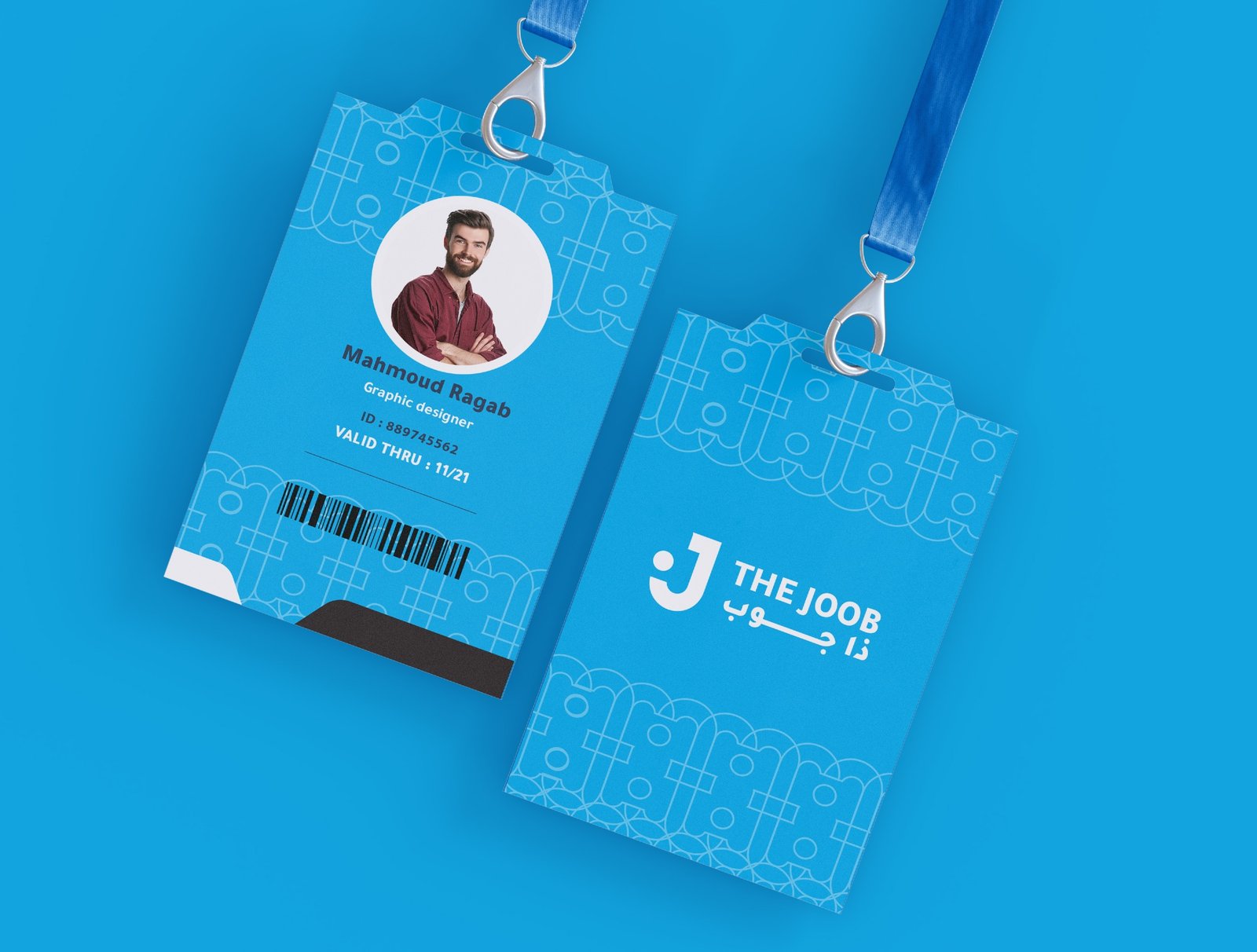 Detailed front and back view of the official staff ID card featuring custom pattern work.